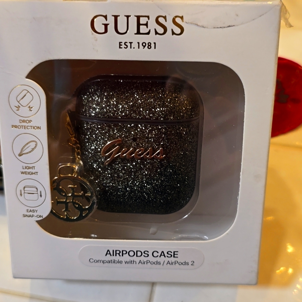 Guess Gold Glittery Airpod case